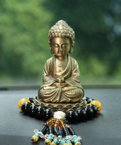 Tượng Phật A Di Đà để trên taplo xe hơi